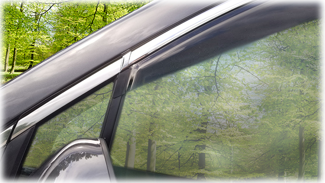 Shown is a close-up of front edge of window visor on a 2020 model: Set of four WV-19A-TF Tape-On Outside-Mount Window Visor Rain Guards With Chrome-Style Accent Trim to complement your model's OEM design and fit 2019, 2020, 2021, 2022 Subaru Ascent