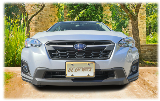 The C&C CarWorx license bracket is custom designed to fit precisely around the model's front end grilles offering a professional and clean look. Shown with a gold license frame around the license which does not come with this purchase. 

